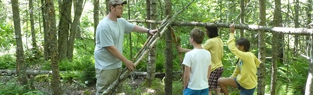 Building a lean-to at Adventure Camp at Nichols Day Camps